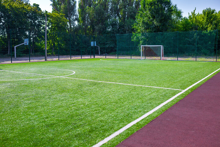 Synthetic turf sports surface installation